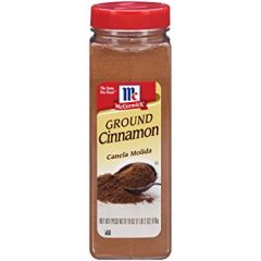 Front view of a 1 lb McCormick Ground Cinnamon container